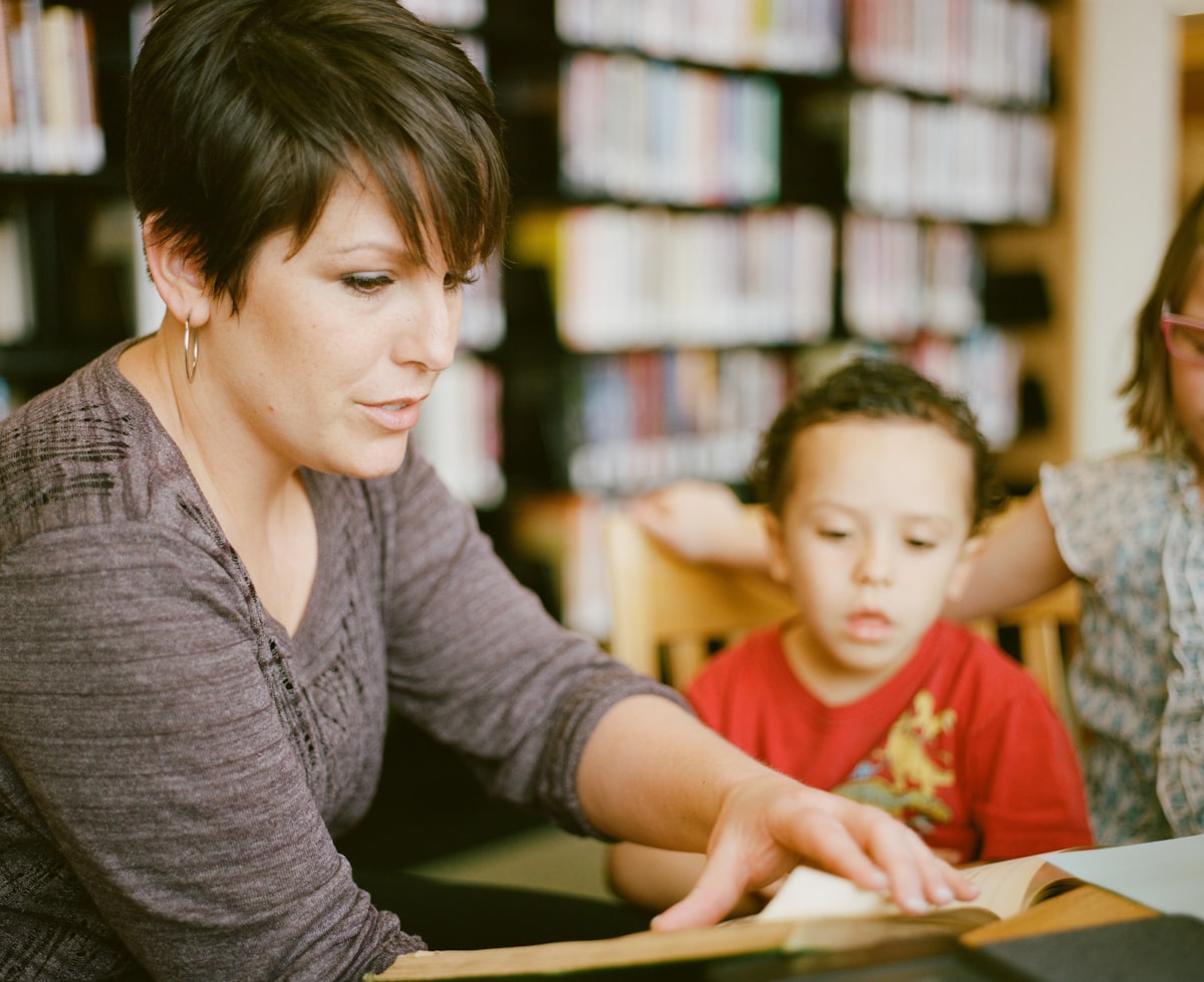 A teacher reviewing and editing lesson materials